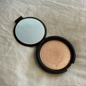 BECCA Champagne Pop